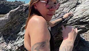 hot brunette passionately fucks stranger sloppy on public beach