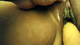 Amateur couple engages in bold shaved pussy play at home