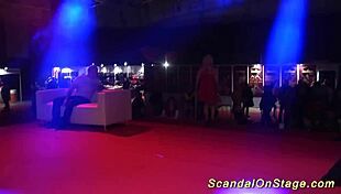 scandal show on public stage with ripped clothes, striptease, and dildo masturbation!