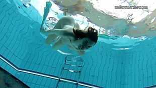 gazel podvodkova swims naked underwater in bikini
