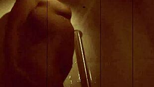 Sexy Dahlia Masturbates In The Shower With Her Tits And Ass