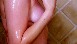 Sexy Brunette Model Enjoys Relaxing Shower Time