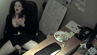 Watch the secretary rub her tits and masturbate?