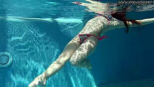 Nicole Pearl super hot and horny shaking ass in the pool with small tits