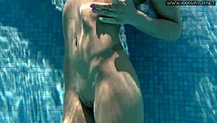 Nicole Pearl super hot and horny shaking ass in the pool with small tits