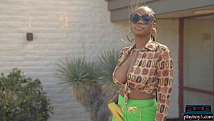 Ebony model Nyla rips clothes to show huge natural tits