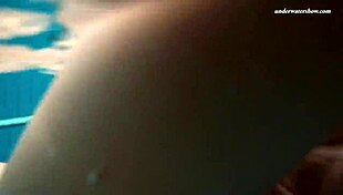 I admire Dashka's beautiful big tits in the pool