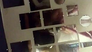 Husband and wife engage in homemade love making.