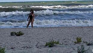 Pornstar engages in doggystyle beach sex with big cock