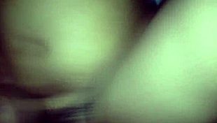 My wife lies with legs spread apart, revealing her bushy, hairy vagina for close inspection