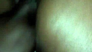 Rubbing Body Oil On A Black Milf