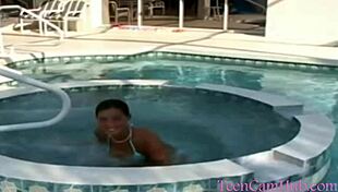 Big tits by the pool in a bikini, teasing the model