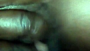 Rubbing Body Oil On A Black Milf