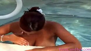 Big tits by the pool in a bikini, teasing the model