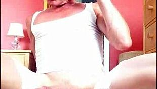 Shemale In Stockings Strokes Her Cock