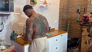 caught this tattooed slut with big tits in the kitchen