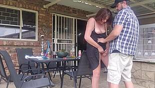 Neighbor's wife gets intense outdoor fuck while husband works