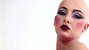 bald head luca bella in a hot latex corset 😏