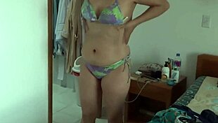 beautiful mature woman shows off in bikini on the beach in great compilation