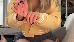 Pretty blonde Amelie Dubon gives close-up handjob to her friend in homemade video