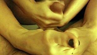 Watch my wife's pussy get wet as I cum on her feet