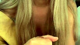 Pretty blonde Amelie Dubon gives close-up handjob to her friend in homemade video