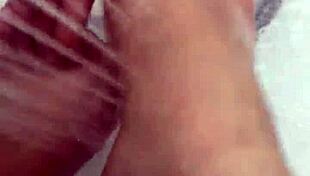 i take off my nylon and take a shower, giving footjob to babe
