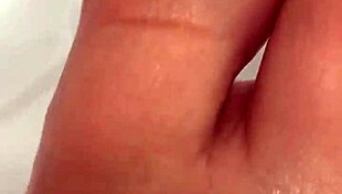 i take off my nylon and take a shower, giving footjob to babe
