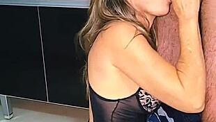 Blonde wife enjoys intimate moment with husband in the kitchen