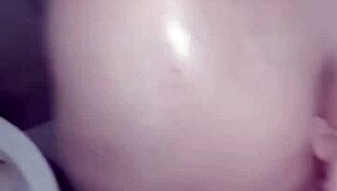 Feeling intense pleasure as I give a delicious blowjob in the steamy bath, my big ass on display.