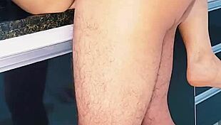 Blonde wife enjoys intimate moment with husband in the kitchen