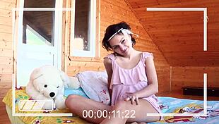 Is this hippie babe naughty with her teddy, stripping and masturbating her hairy pussy?