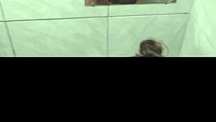 Feeling intense pleasure as I give a delicious blowjob in the steamy bath, my big ass on display.