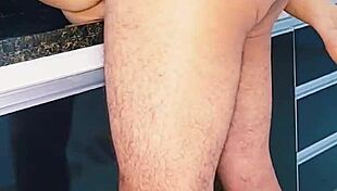 Blonde wife enjoys intimate moment with husband in the kitchen