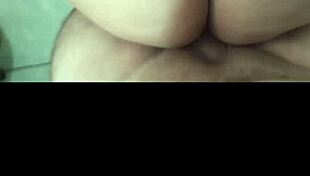 Feeling intense pleasure as I give a delicious blowjob in the steamy bath, my big ass on display.