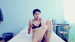 young gay guy in crossdressing session in his room