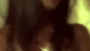 sexy brunette naked by the fire, dancing and teasing