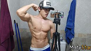 Watch me flex my muscles and cum hard in the bathroom