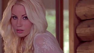 Sarah Summers is stripping and revealing her amazing boobs.