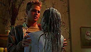 Tania Saulnier is a sexy blonde in the shower, nude and bathing.