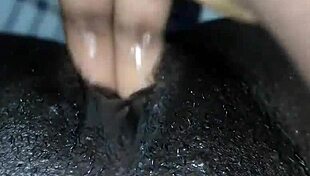 black woman enjoys wet pussy solo masturbation at home