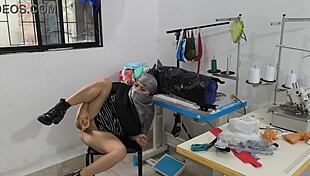 Indian seamstress fingers herself hot in clothing workshop.