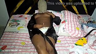 Curvy ebony woman enjoys feeling horny while playing with her big tits and ass