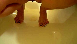 Why does this milf caress her anal before showing her pussy inside and pissing?