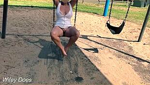 I watch my wife swing with no panties, flashin her tits outside.