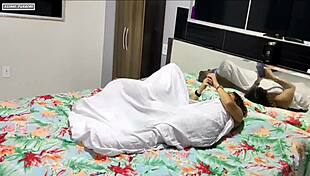 Curly-haired girl does handjob beside me, then falls on dick until he cums