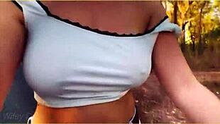 Amazing milf flashes her big tits on a public bike ride!