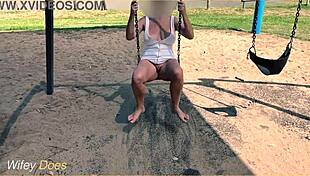 I watch my wife swing with no panties, flashin her tits outside.