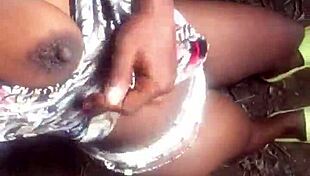 in a homemade scene, she talks dirty while showing her small tits and pussy.