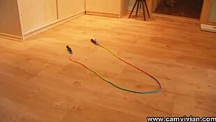 Babe skips rope topless with bouncing boobs and big ass in stockings.